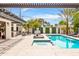Inviting backyard with a pool, spa, multiple seating areas, and stylish landscaping under a bright sky at 1609 W State Ave, Phoenix, AZ 85021