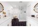 Beautiful bathroom with dual vanities, sleek fixtures, and a modern glass-enclosed shower at 1609 W State Ave, Phoenix, AZ 85021
