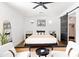 Chic bedroom with a calm ambiance, featuring modern décor, a ceiling fan, and a cozy atmosphere at 1609 W State Ave, Phoenix, AZ 85021