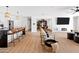 Bright open-concept living area, adjacent to the kitchen, with views to the back dining room and modern furniture at 1609 W State Ave, Phoenix, AZ 85021