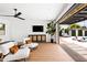 Airy main bedroom with stylish furnishings and seamless transition to a tranquil outdoor lounge area at 1609 W State Ave, Phoenix, AZ 85021
