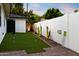 Backyard putting green offering a fun, recreational amenity with professionally manicured artificial turf at 1609 W State Ave, Phoenix, AZ 85021