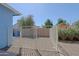 Fenced backyard featuring low-maintenance landscaping with gravel and privacy wall at 16256 N 64Th Pl, Scottsdale, AZ 85254