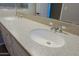 Bathroom vanity with double sinks and quartz countertops at 16256 N 64Th Pl, Scottsdale, AZ 85254