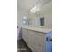 Bathroom vanity with double sinks and plenty of storage at 16256 N 64Th Pl, Scottsdale, AZ 85254