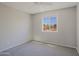 Bedroom with a window overlooking the neighborhood at 16256 N 64Th Pl, Scottsdale, AZ 85254