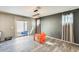 Bright dining area with sliding glass door to the backyard and modern pendant lighting at 16562 W Sierra St, Surprise, AZ 85388