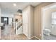 Inviting entryway with staircase, coat closet, and easy access to the half bathroom at 16562 W Sierra St, Surprise, AZ 85388