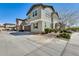 Two story home features a desert landscaped yard and a convenient two car attached garage at 16562 W Sierra St, Surprise, AZ 85388