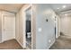 Hallway features access to a nearby bathroom and bedroom at 16562 W Sierra St, Surprise, AZ 85388