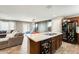 Spacious kitchen area, and open-concept layout that seamlessly blends living areas at 16562 W Sierra St, Surprise, AZ 85388