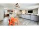 Open floorplan connecting kitchen, dining area, and living room, perfect for entertaining at 16562 W Sierra St, Surprise, AZ 85388