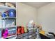 Functional storage area featuring shelving and drawer units for organization at 16562 W Sierra St, Surprise, AZ 85388