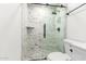 Modern bathroom featuring glass enclosed shower and sleek hardware at 17411 N 36Th St, Phoenix, AZ 85032