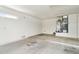 A bright and spacious garage space features a water heater and furnace for home climate control and utility at 18013 N Sterling Dr, Surprise, AZ 85374