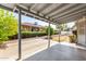 Covered patio area offering views of the landscaped backyard at 1837 E Presidio Rd, Phoenix, AZ 85022