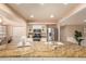 Bright kitchen with a granite island, updated appliances, and an open-concept layout at 1837 E Presidio Rd, Phoenix, AZ 85022