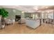 Open-concept living space, featuring a vaulted ceiling, and seamless flow into the kitchen at 1837 E Presidio Rd, Phoenix, AZ 85022