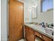 Functional bathroom with a single vanity, a granite countertop, and an enclosed shower area at 1849 E Jarvis Ave, Mesa, AZ 85204