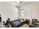 Minimalist bedroom with a ceiling fan, neutral walls, and a serene atmosphere for restful sleep at 20017 S 192Nd Pl, Queen Creek, AZ 85142