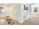 Inviting entryway featuring tile flooring, modern decor, and a bright, welcoming ambiance with a view into the home at 20017 S 192Nd Pl, Queen Creek, AZ 85142
