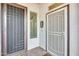 Well-lit front entrance featuring dual security doors and a decorative welcome sign for added curb appeal at 20017 S 192Nd Pl, Queen Creek, AZ 85142