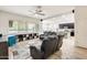Open-concept living room with recessed lighting, tile floors, and expansive views into the kitchen and dining area at 20017 S 192Nd Pl, Queen Creek, AZ 85142