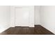 Bright bedroom with hardwood floors and a double door closet at 2031 S 86Th Ln, Tolleson, AZ 85353