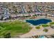 Enjoy community living with a green golf course and tranquil lake at 20609 N Canyon Whisper Dr, Surprise, AZ 85387