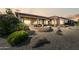 Enjoy the outdoors with an outdoor kitchen and patio area at 20609 N Canyon Whisper Dr, Surprise, AZ 85387