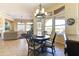 Bright dining area offering seamless access to the outdoors, perfect for entertaining and enjoying natural light at 20609 N Canyon Whisper Dr, Surprise, AZ 85387