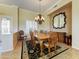 Formal dining room boasting elegant lighting, neutral tones, and a charming dining set at 20609 N Canyon Whisper Dr, Surprise, AZ 85387