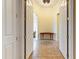 Elegant foyer with decorative tiled floor design and an arched entryway at 20609 N Canyon Whisper Dr, Surprise, AZ 85387
