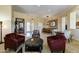 Inviting living area offering a versatile layout, bright lighting, and seamless flow at 20609 N Canyon Whisper Dr, Surprise, AZ 85387