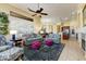 Spacious living area with an open layout, ideal for entertaining and everyday living. Includes a cozy fireplace feature at 20609 N Canyon Whisper Dr, Surprise, AZ 85387