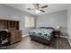 Bright bedroom with a desk and a ceiling fan at 2136 W Pickett Ct, San Tan Valley, AZ 85144