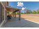 Back patio with a concrete floor and a view of the vacant backyard at 2136 W Pickett Ct, San Tan Valley, AZ 85144
