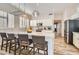 Spacious kitchen with a large island, stainless steel appliances, and modern lighting at 2448 S Salida Del Sol --, Chandler, AZ 85286