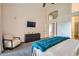 Bright main bedroom with vaulted ceilings, plush carpet, and a cozy sitting area at 2448 S Salida Del Sol --, Chandler, AZ 85286