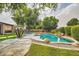 The inviting pool area is surrounded by lush greenery and ample space for lounging at 2448 S Salida Del Sol --, Chandler, AZ 85286