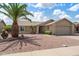 Inviting single-story home with well-kept desert landscaping and a two-car garage at 2673 Leisure World --, Mesa, AZ 85206
