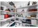 Pantry with shelving filled with cooking equipment and food storage containers at 2673 Leisure World --, Mesa, AZ 85206