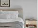 Comfortable bedroom featuring a well-made bed and a bedside table with decor at 2814 N 62Nd N St, Scottsdale, AZ 85257
