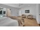 Bedroom with light hardwood flooring, ample space, and access to outdoor patio at 2814 N 62Nd N St, Scottsdale, AZ 85257