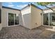 Private patio featuring brick pavers, sliding glass doors, and mature shade tree at 2814 N 62Nd N St, Scottsdale, AZ 85257