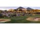 Golf course view featuring manicured greens and mountain views at 30271 N 117Th Dr, Peoria, AZ 85383