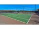 Well-maintained tennis courts offering a great recreational amenity within a gated community with mountain views at 30271 N 117Th Dr, Peoria, AZ 85383