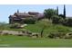 Elegant estate on a hill overlooking the golf course and community at 3086 S First Water Ln, Gold Canyon, AZ 85118