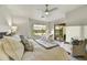 Bright main bedroom featuring a golf course view and balcony access, providing a serene escape at 3086 S First Water Ln, Gold Canyon, AZ 85118