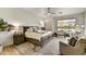 Relaxing main bedroom with natural light, a king bed, calming decor and a lovely golf course view at 3086 S First Water Ln, Gold Canyon, AZ 85118